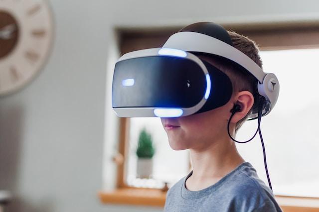 Boy wearing a VR helmet
