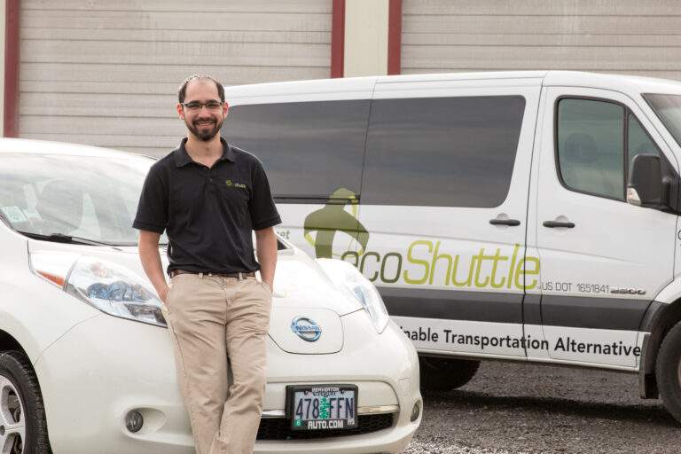 A shuttle bus staff ready to assist your charter bus needs.