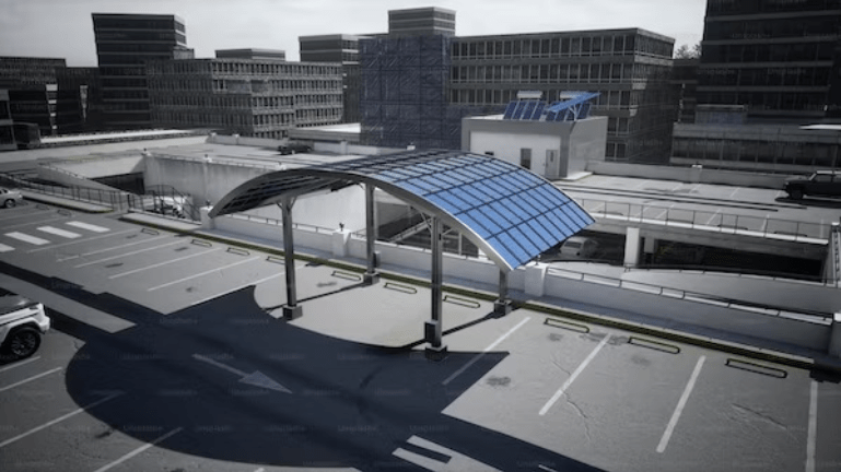 A parking lot in a city featuring a structure with a solar panel.