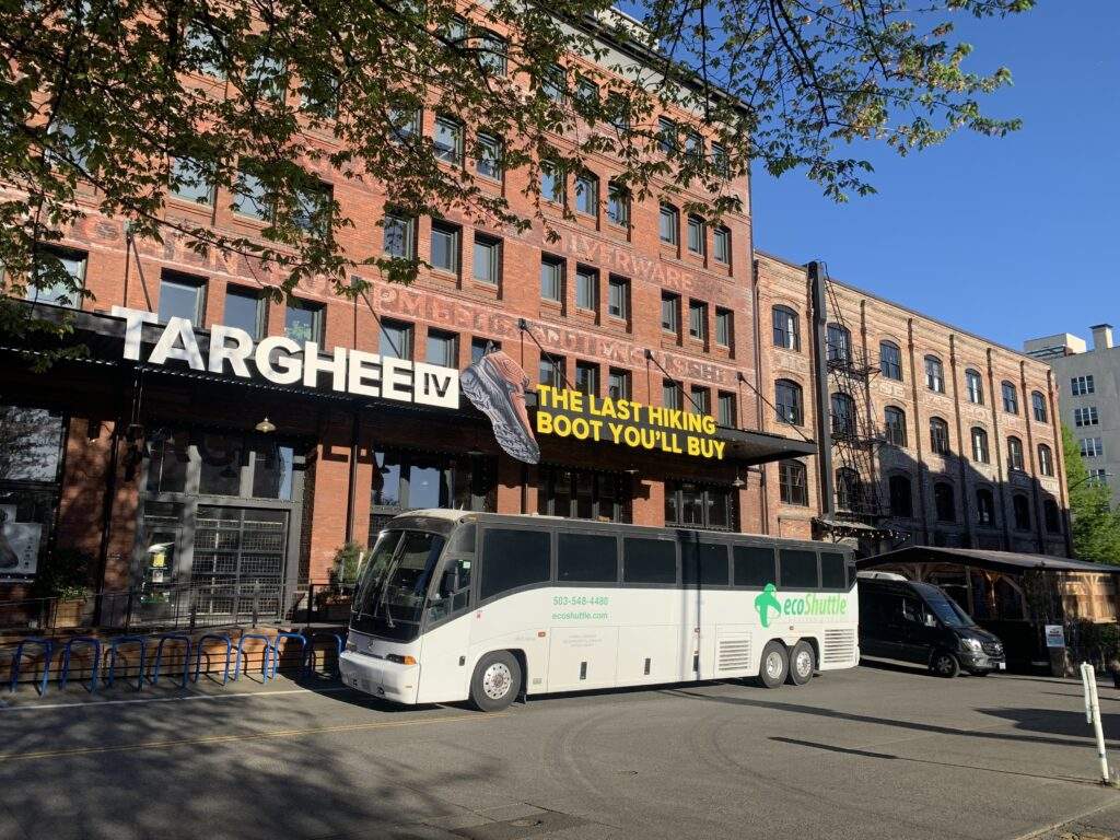 A Charter bus picking up for a corporate event in Portland, Oregon.