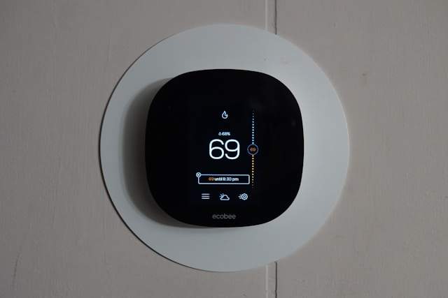Close-up of black thermostats showing 