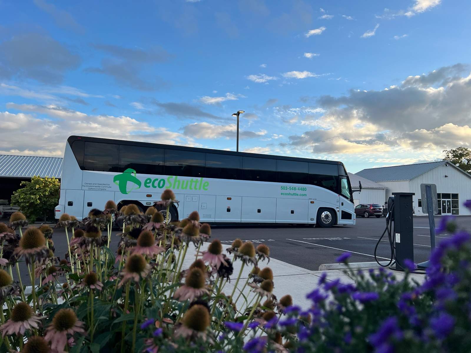 A charter bus picking up in Portland.