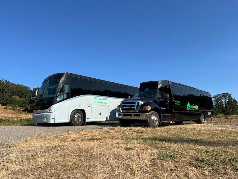 A Portland charter bus and mini bus on a scenic trip.